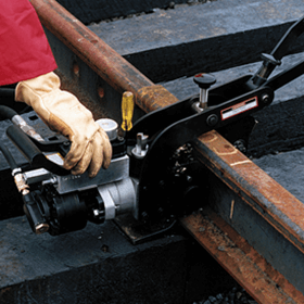 hand on tool on rail hydraulic rail drill in use hydraulic tools and attachments
