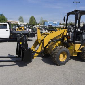 pallet forks front view tractor install skid-steer blue diamond dealer winnipeg