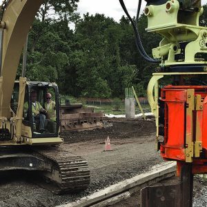 Side Pile driver vibrating attachment - manitoba provider