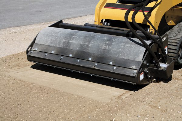 compact skid steer packer