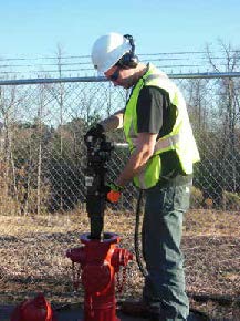 worker using stanley hydrant saver